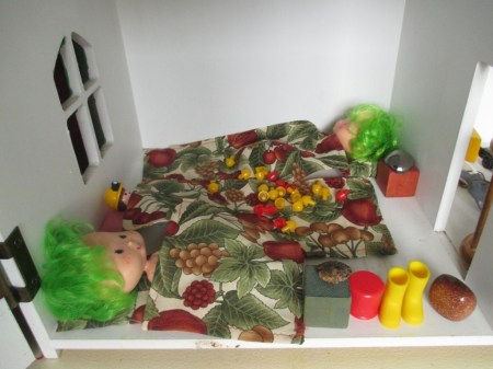 dolls sleeping in the doll house