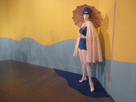 At the beach parasol woman