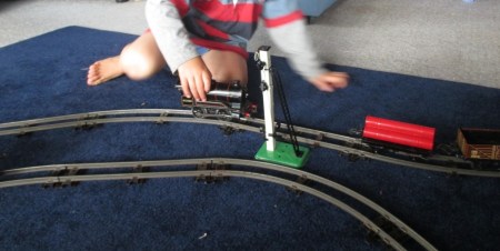 Vintage Hornby train on tracks and signal