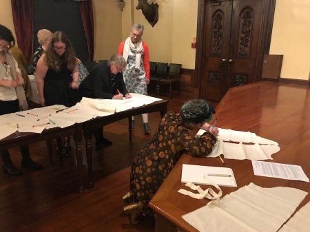 Signing the fabric pieces at Larnach Castle 02 low res