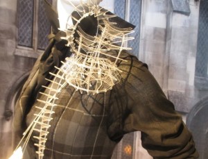 A Darker Eden Mild Red detail black shirt