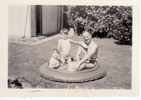 Chris Robt and Robbie in a paddling pool
