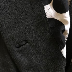 McCalls black dress inside bound button hole detail